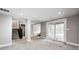 Spacious carpeted basement with a walkout and staircase at 4915 E 79Th St, Indianapolis, IN 46250
