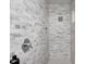 White marble tiled shower with built in niche at 4915 E 79Th St, Indianapolis, IN 46250