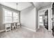 Bedroom with large windows, desk, and grey carpet at 4915 E 79Th St, Indianapolis, IN 46250
