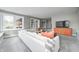 A carpeted living room with a comfortable sofa and great natural light at 4915 E 79Th St, Indianapolis, IN 46250