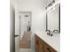 Modern bathroom features quartz counters, contemporary lighting, and sleek fixtures at 5123 Oak Ridge Pl, Columbus, IN 47201