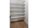Walk in closet features shelving, hardware flooring, and recessed lighting at 5123 Oak Ridge Pl, Columbus, IN 47201
