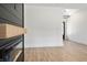 Bright living room featuring a modern fireplace, wood floors, and fresh paint at 5123 Oak Ridge Pl, Columbus, IN 47201