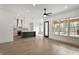 Open concept living area that leads to a well appointed kitchen and an outdoor patio at 5123 Oak Ridge Pl, Columbus, IN 47201