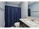 Clean bathroom with modern vanity, granite countertop, and a shower featuring a contemporary mirror at 5150 Bramwell Ln, Whitestown, IN 46075