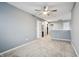 Spacious bedroom features neutral walls, plush carpet, and lots of natural light for a warm ambiance at 5150 Bramwell Ln, Whitestown, IN 46075