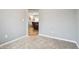 View from bedroom into the living room with a comfortable recliner at 5150 Bramwell Ln, Whitestown, IN 46075