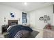 Cozy bedroom with a comfortable bed, unique decor, and soft lighting creating a warm and inviting space at 5150 Bramwell Ln, Whitestown, IN 46075