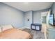Neutral-toned bedroom with soft carpet and a view into the house hallway at 5150 Bramwell Ln, Whitestown, IN 46075