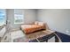 Neutral bedroom with carpet, a double bed, dresser, and window offering a serene atmosphere at 5150 Bramwell Ln, Whitestown, IN 46075