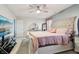 Bright main bedroom with plush carpet, large television, and neutral color palette at 5150 Bramwell Ln, Whitestown, IN 46075