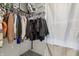 Walk-in closet with organized hanging space, shelving for storage, and neutral decor at 5150 Bramwell Ln, Whitestown, IN 46075