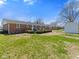 Backyard with patio and a view of a home's shed at 5240 Magnolia Dr, Columbus, IN 47203