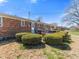 Backyard showing a brick home and a patio set at 5240 Magnolia Dr, Columbus, IN 47203