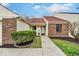 Charming single-story home with brick accents and manicured landscaping at 5453 Happy Hollow # 73, Indianapolis, IN 46268