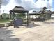 Backyard with gazebos, metal palm tree, shed, patio, and outdoor furniture at , Indianapolis, IN 46203