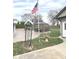 Landscaped backyard with custom sign, gazebo, and American flag at , Indianapolis, IN 46203