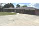 Charming brick home with manicured lawn and extra-long driveway leading to an attached two-car garage at , Indianapolis, IN 46203