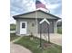 Detached garage with custom address sign and landscaped lawn at , Indianapolis, IN 46203