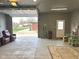 Open garage offering access to the driveway, providing convenient parking and storage space at , Indianapolis, IN 46203