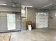 Well-lit garage with a door to the outside and essential utilities for added functionality at , Indianapolis, IN 46203