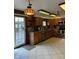 Spacious kitchen boasting a sliding glass door, stainless steel appliances, and stylish tile backsplash at , Indianapolis, IN 46203