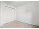 Cozy bedroom featuring a closet, neutral carpet and white walls at 5842 Minden Dr, Indianapolis, IN 46221