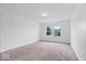 Simple bedroom with carpet and natural light from a double window at 5842 Minden Dr, Indianapolis, IN 46221
