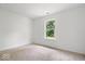 Carpeted bedroom featuring bright sunlight and fresh air at 5842 Minden Dr, Indianapolis, IN 46221