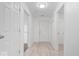Inviting hallway with neutral flooring leading to multiple doorways, maximizing space and functionality at 5842 Minden Dr, Indianapolis, IN 46221