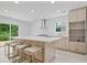 Bright kitchen with a large island, stainless steel appliances, and modern cabinets at 5842 Minden Dr, Indianapolis, IN 46221