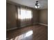 Bright bedroom with hard wood floors and large window with curtains at 589 S 100 W, Franklin, IN 46131