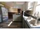 Sunlit kitchen featuring white cabinets, stainless appliances, and open layout at 589 S 100 W, Franklin, IN 46131