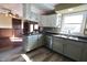 Spacious kitchen blending style with stainless appliances and an adjoining living room at 589 S 100 W, Franklin, IN 46131