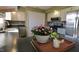 Bright kitchen with white cabinets, stainless appliances, and decorative countertop accents at 589 S 100 W, Franklin, IN 46131