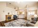 Bright and spacious living room featuring vaulted ceilings, fireplace, and open concept design at 6145 Crystal View Dr, Indianapolis, IN 46237