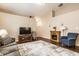Bright and spacious living room featuring vaulted ceilings and comfortable seating area at 6145 Crystal View Dr, Indianapolis, IN 46237