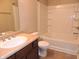 Well lit bathroom with a bathtub, vanity and toilet at 6418 W Oxford Ln, McCordsville, IN 46055