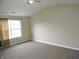 Comfortable bedroom featuring a ceiling fan and a large window at 6418 W Oxford Ln, McCordsville, IN 46055