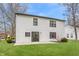 Well-maintained backyard with a lush lawn and a two-story home with black trim windows at 6733 Dorchester Dr, Zionsville, IN 46077