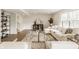 Open-concept living room featuring stylish furniture and decor, bathed in natural light at 6733 Dorchester Dr, Zionsville, IN 46077