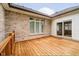Wooden deck area featuring brick and siding details of the home's exterior at 7271 Catboat Ct, Fishers, IN 46038