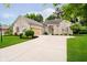 Beautiful brick home with manicured lawn, covered porch, and spacious driveway at 7271 Catboat Ct, Fishers, IN 46038