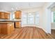 Bright kitchen with hardwood floors, granite countertops and a sunlit breakfast nook at 7271 Catboat Ct, Fishers, IN 46038