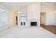 Spacious living area features a fireplace and built-in shelving units at 7271 Catboat Ct, Fishers, IN 46038