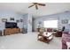 Spacious living room with ample seating and plenty of natural light at 7349 Castleton Farms N Dr, Indianapolis, IN 46256
