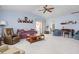 Spacious living room with high ceilings, ample seating, and bright, neutral paint at 7349 Castleton Farms N Dr, Indianapolis, IN 46256