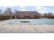 Back view of Community pool covered for the off-season at 7349 Castleton Farms N Dr, Indianapolis, IN 46256