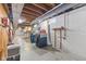 Basement laundry area with washer, dryer, and ample storage space at 791 S Us Highway 31, Whiteland, IN 46184