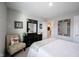 Cozy bedroom with comfortable furniture and mirrors at 8194 Bostic Ct, Fishers, IN 46038